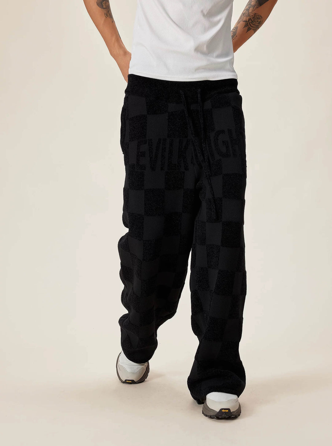 EVILKNIGHT(EK) Jacquard Logo Plaid Knit Pants | Face 3 Face