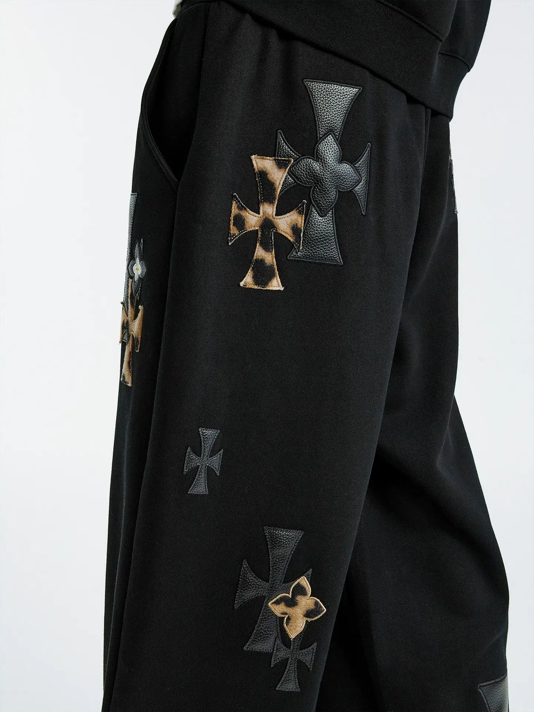 MEDM Leather Cross Star Patchwork Sweatpants | Face 3 Face