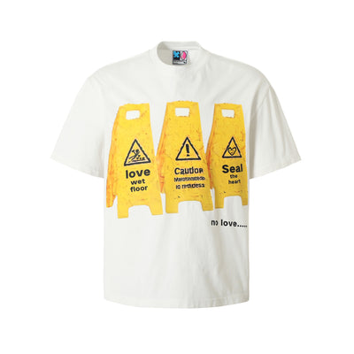 YADcrew “Love Caution Seal” Print Tee | Face 3 Face