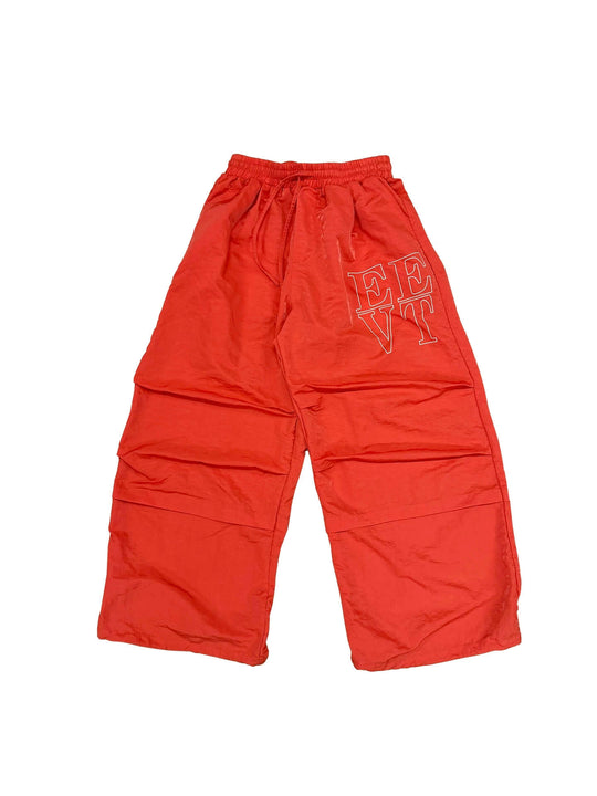 EVETS Orange Logo Print Nylon Baggy Track Pants | Face 3 Face