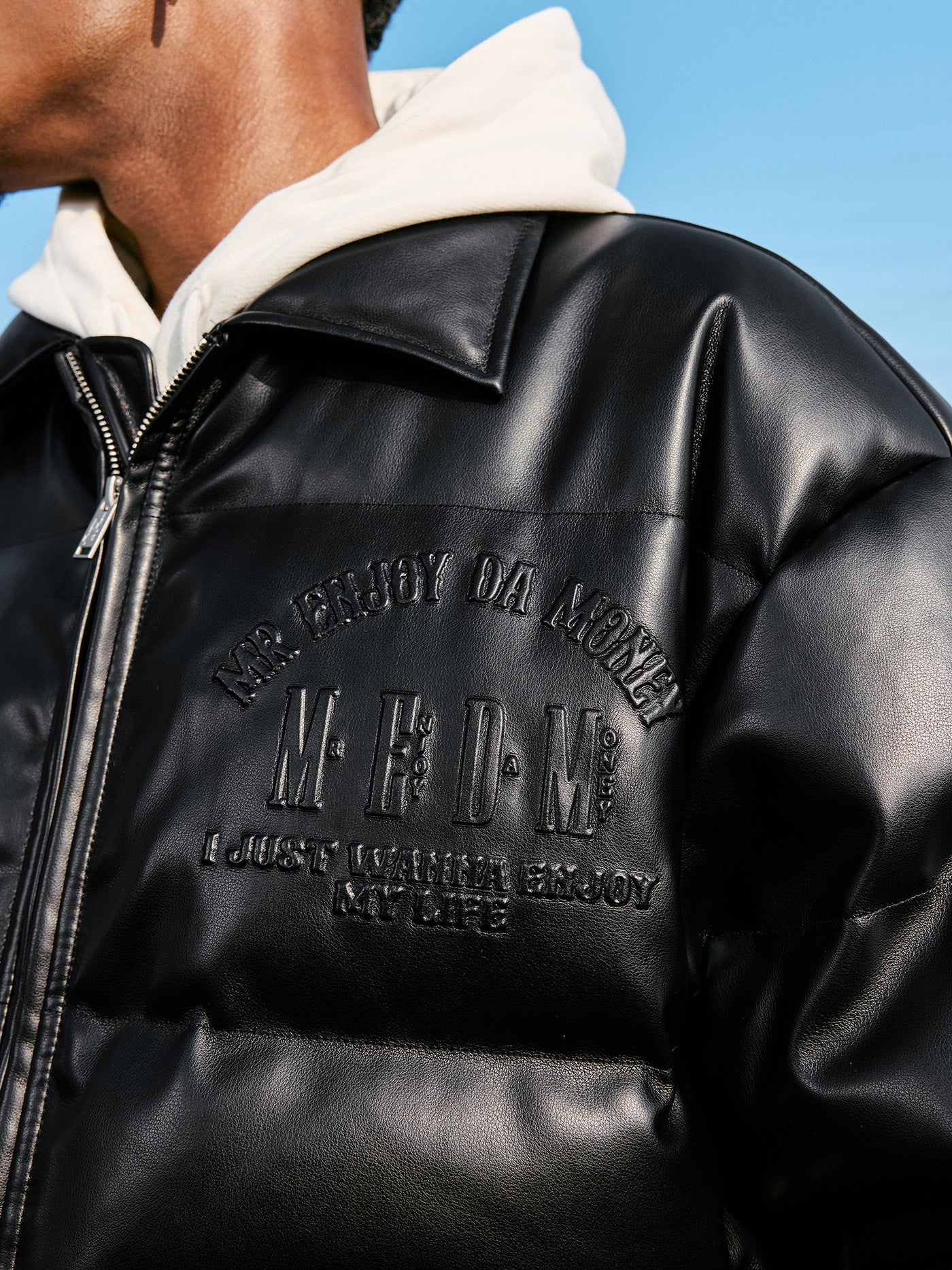 MEDM Embossed LOGO Leather Down Jacket | Face 3 Face