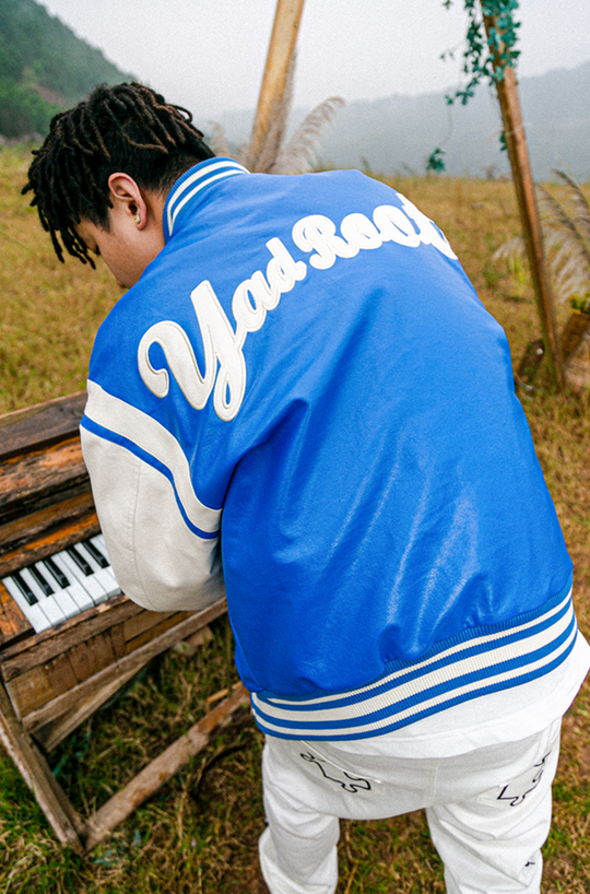 YADcrew X ROOT Puzzle Stitching Leather Varsity Jacket