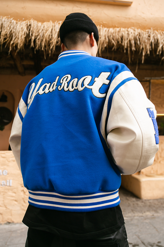 YADcrew X ROOT Puzzle Stitching Varsity Jacket