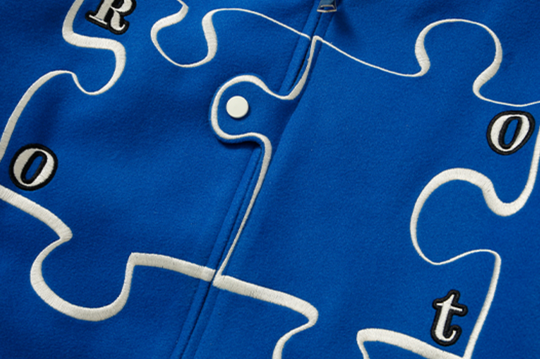 YADcrew X ROOT Puzzle Stitching Varsity Jacket