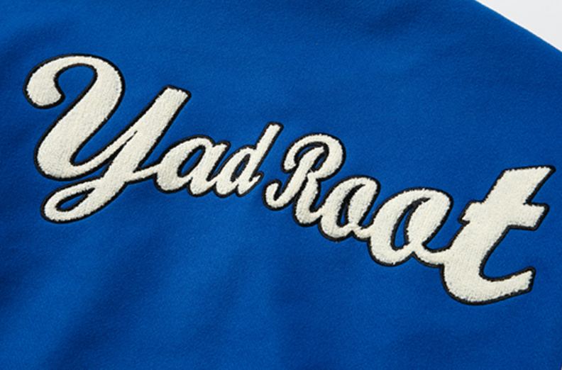 YADcrew X ROOT Puzzle Stitching Varsity Jacket