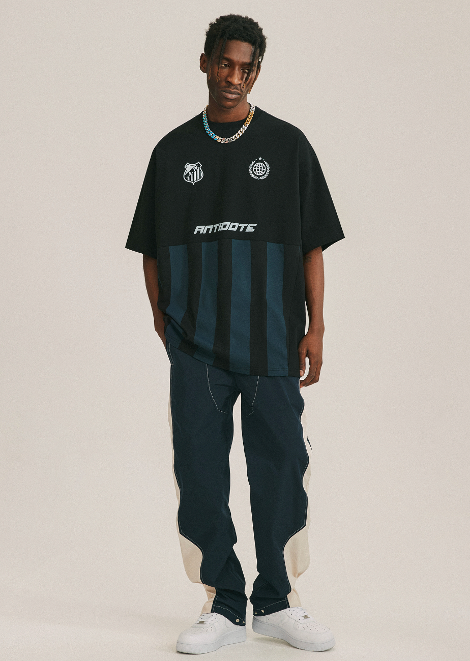 ANTIDOTE Deconstructed Splicing Nylon Zipper Pants