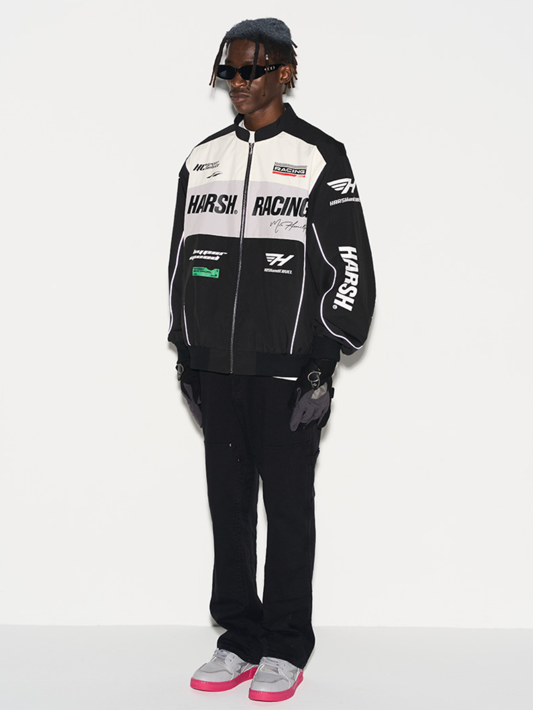 Harsh and Cruel Retro Motorcycle Racing Logo Jacket - This stylish jacket evokes the nostalgic atmosphere and powerful design of classic motorcycle racing. With high-quality materials and a bold logo print, it's a striking statement piece that seamlessly integrates into a street-style wardrobe. Versatile for spring and fall layering, this jacket captures the energy of the racetrack.