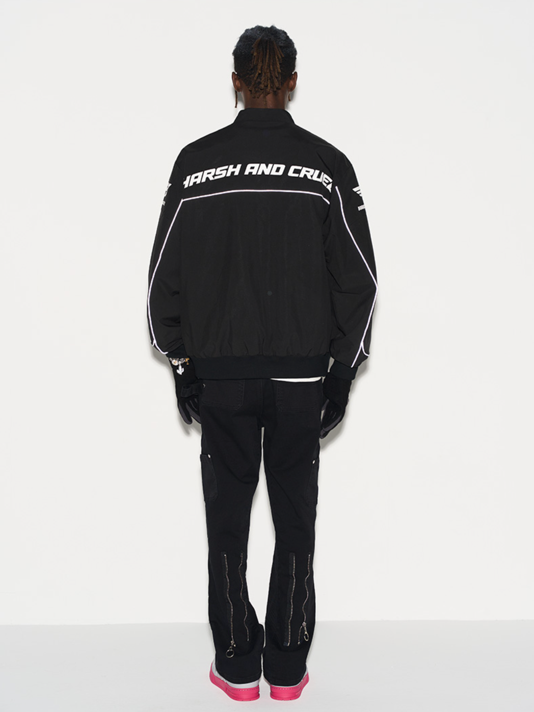 Harsh and Cruel Retro Motorcycle Racing Logo Jacket - This stylish jacket evokes the nostalgic atmosphere and powerful design of classic motorcycle racing. With high-quality materials and a bold logo print, it's a striking statement piece that seamlessly integrates into a street-style wardrobe. Versatile for spring and fall layering, this jacket captures the energy of the racetrack.