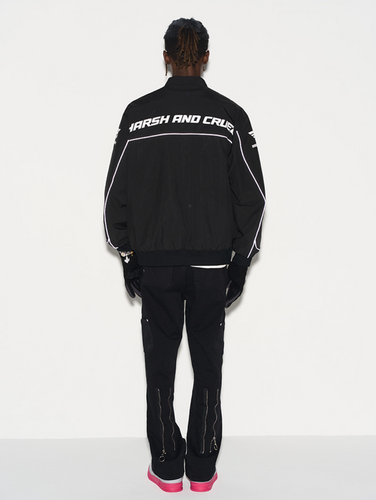 Harsh and Cruel Retro Motorcycle Racing Logo Jacket - This stylish jacket evokes the nostalgic atmosphere and powerful design of classic motorcycle racing. With high-quality materials and a bold logo print, it's a striking statement piece that seamlessly integrates into a street-style wardrobe. Versatile for spring and fall layering, this jacket captures the energy of the racetrack.