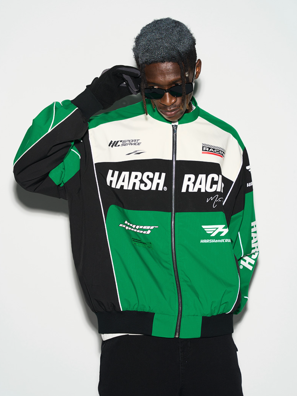 Harsh and Cruel Retro Motorcycle Racing Logo Jacket - This stylish jacket evokes the nostalgic atmosphere and powerful design of classic motorcycle racing. With high-quality materials and a bold logo print, it's a striking statement piece that seamlessly integrates into a street-style wardrobe. Versatile for spring and fall layering, this jacket captures the energy of the racetrack.