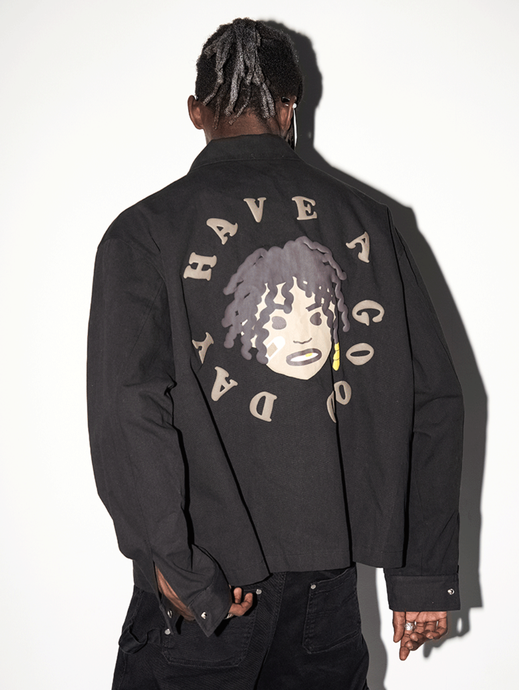 Harsh and Cruel Cartoon Face Foam Print Jacket