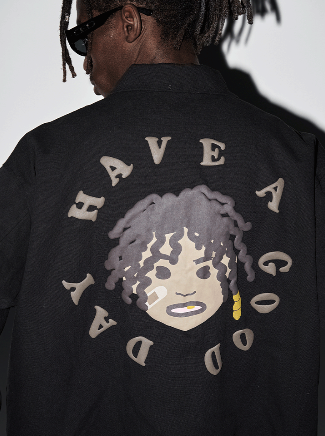 Harsh and Cruel Cartoon Face Foam Print Jacket
