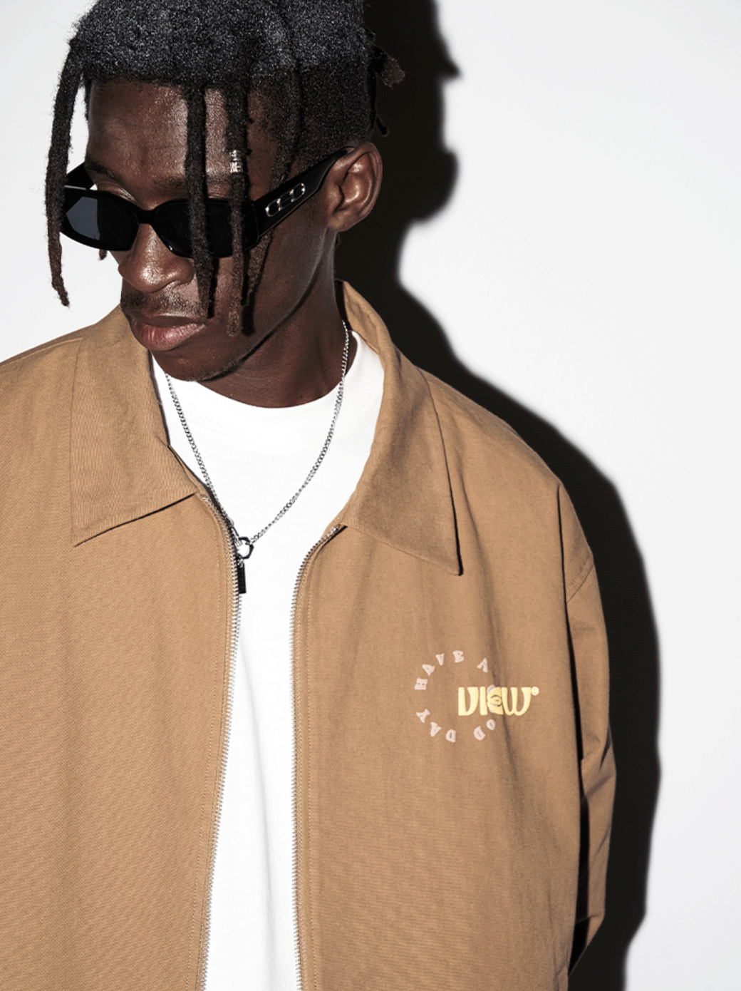 Harsh and Cruel Cartoon Face Foam Print Jacket