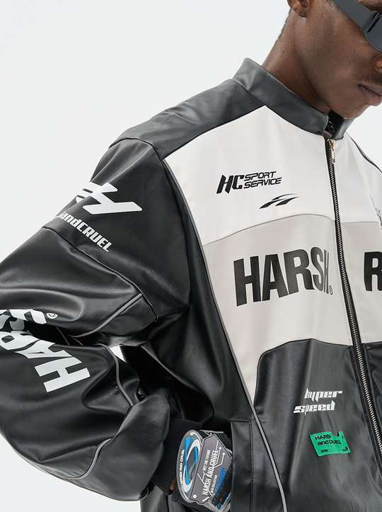 The Harsh and Cruel Biker Stand Up Collar Racing Suit Faux Leather Jacket is a stylish biker-inspired jacket available in black, green, blue, and red colors. It features a stand-up collar, racing suit-inspired design, and is made of faux leather material. The jacket is offered in sizes S through XXL and is priced at $145. Additional details on the product's features and construction are not provided in the given information.