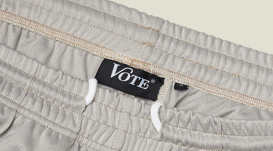 VOTE Striped Tracksuit Pants