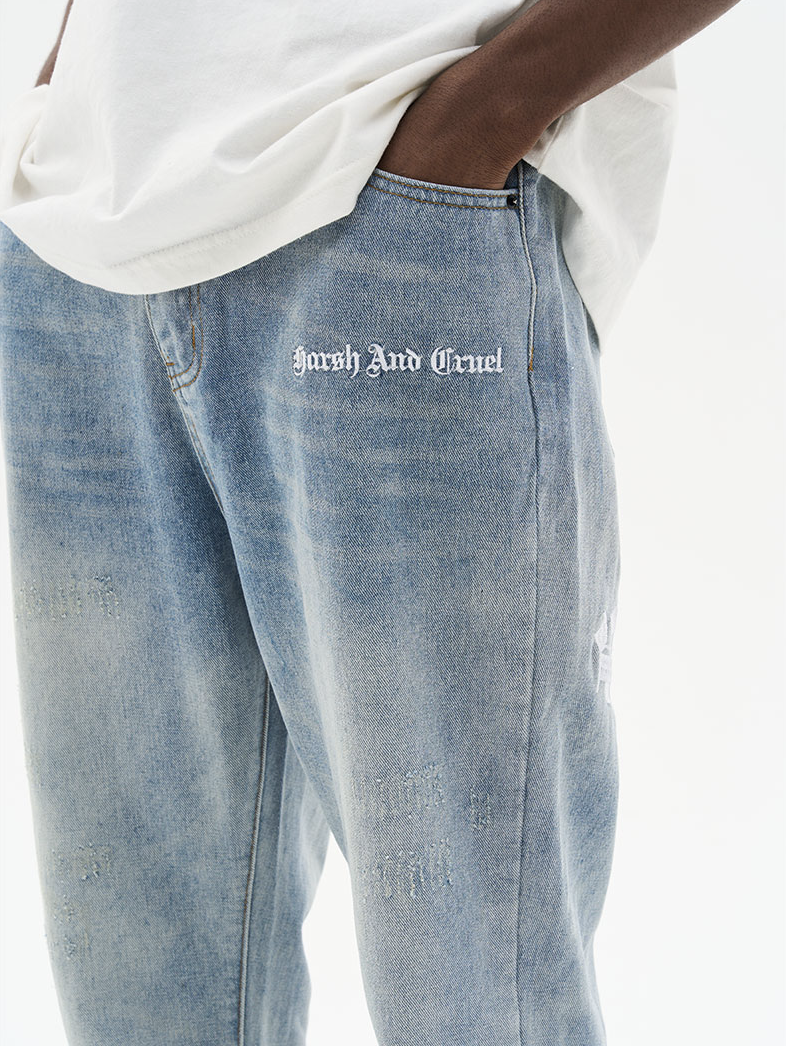 Harsh and Cruel Gothic Logo Embroidered Flared Denim
