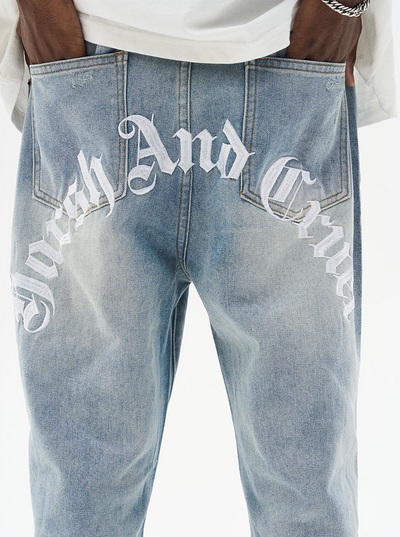 Harsh and Cruel Gothic Logo Embroidered Flared Denim