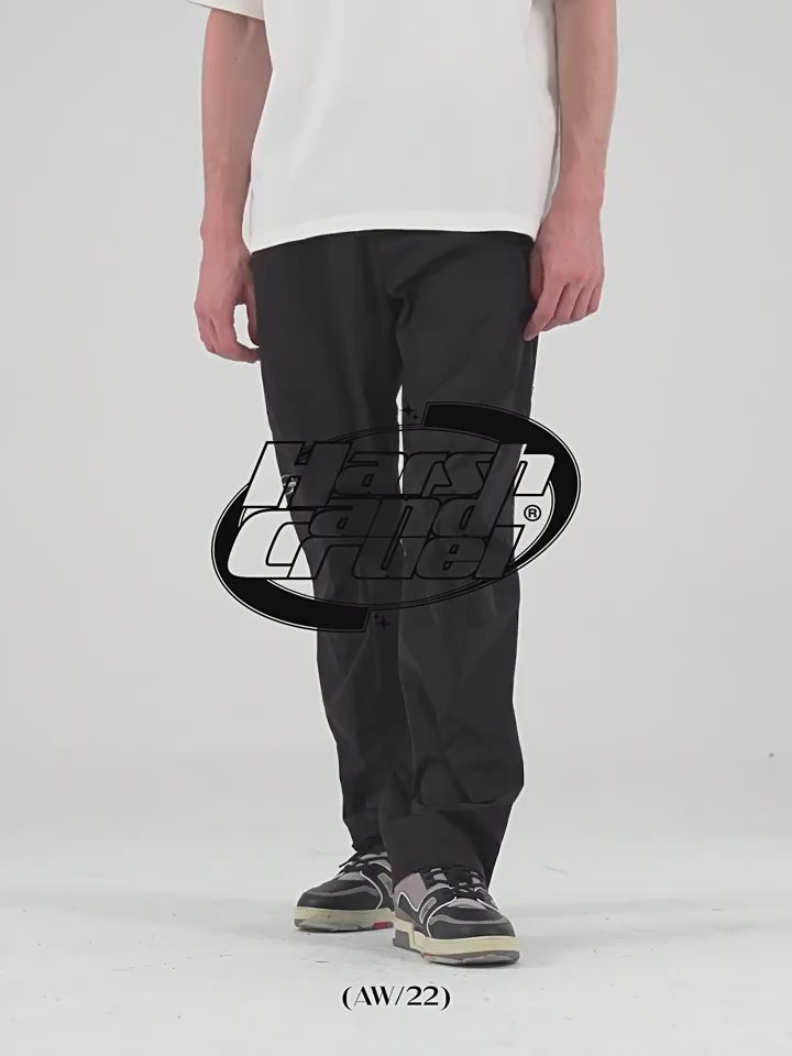 Harsh and Cruel Nylon Logo Flared Trousers