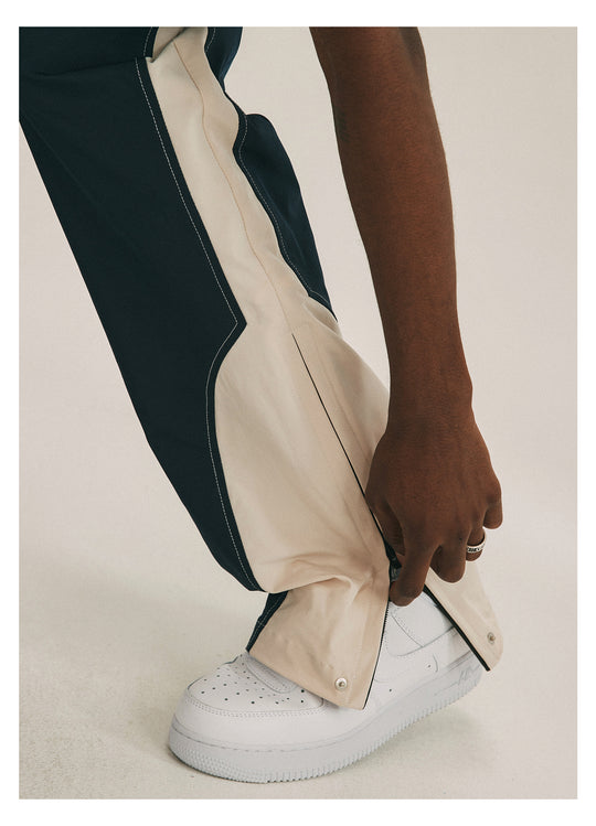 ANTIDOTE Deconstructed Splicing Nylon Zipper Pants