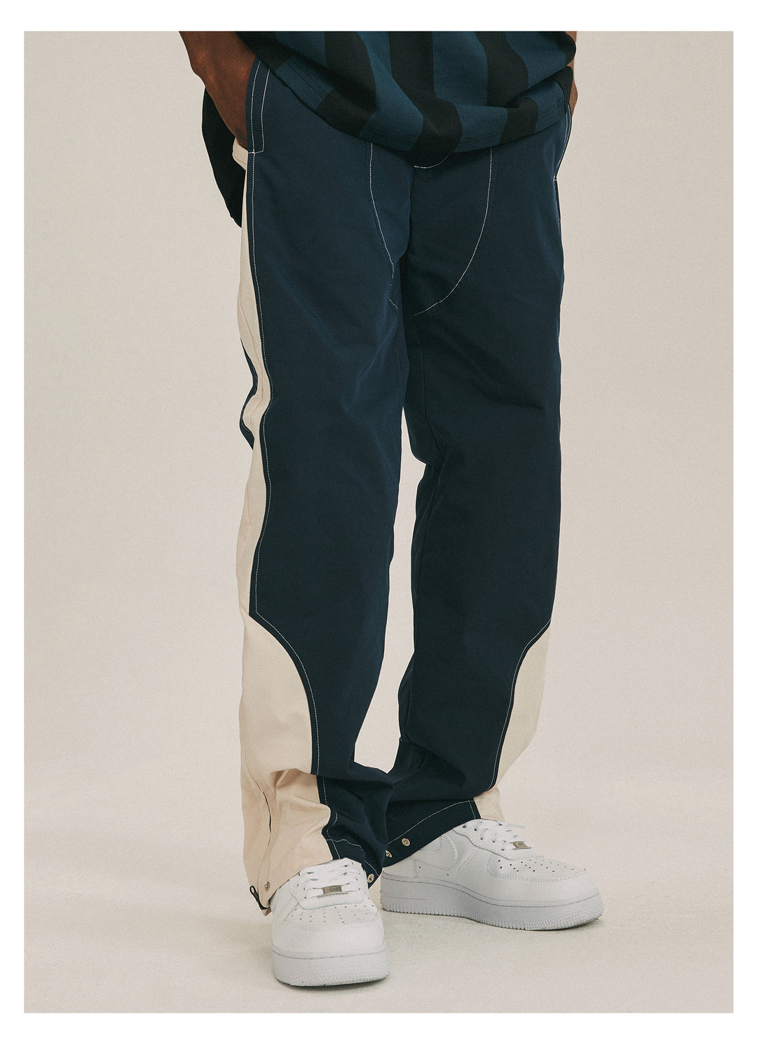 ANTIDOTE Deconstructed Splicing Nylon Zipper Pants