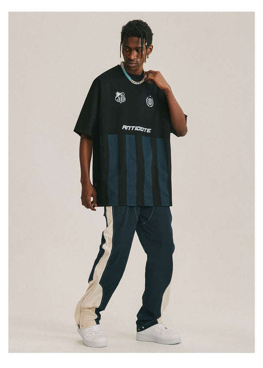 ANTIDOTE Deconstructed Splicing Nylon Zipper Pants