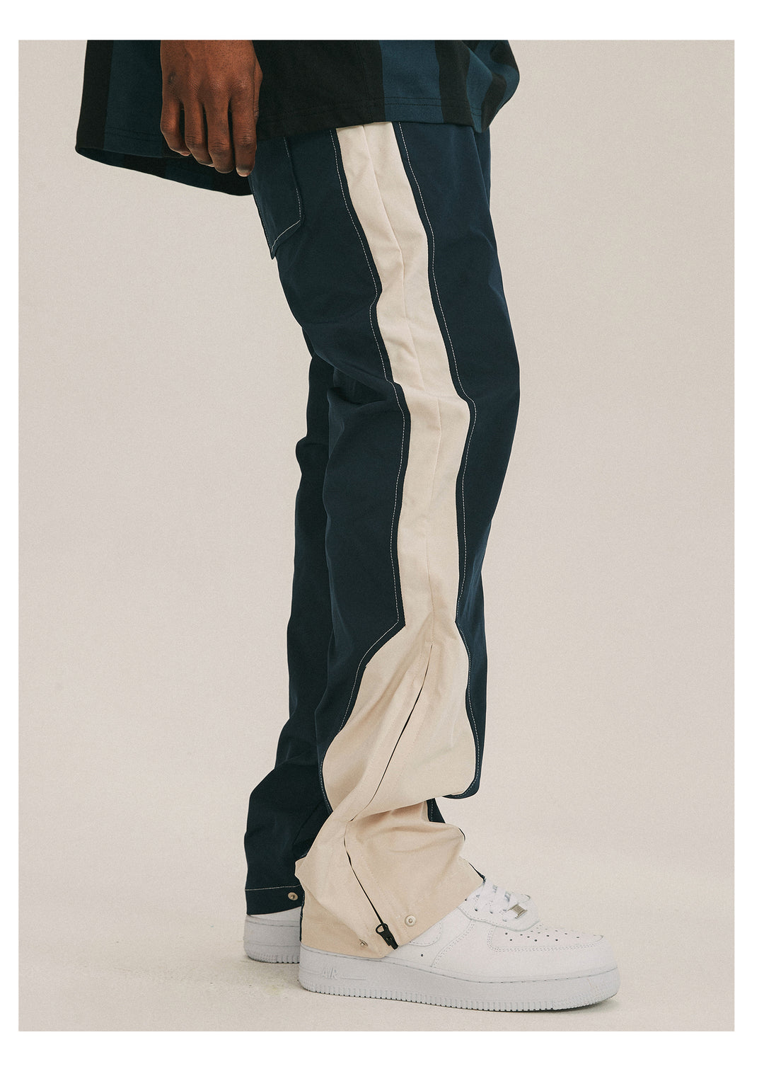 ANTIDOTE Deconstructed Splicing Nylon Zipper Pants