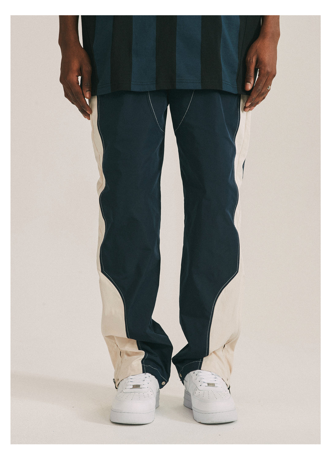 ANTIDOTE Deconstructed Splicing Nylon Zipper Pants