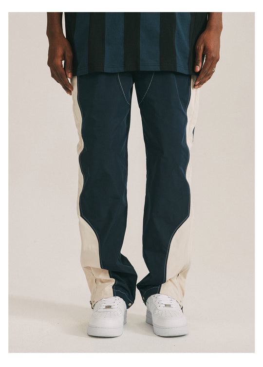 ANTIDOTE Deconstructed Splicing Nylon Zipper Pants